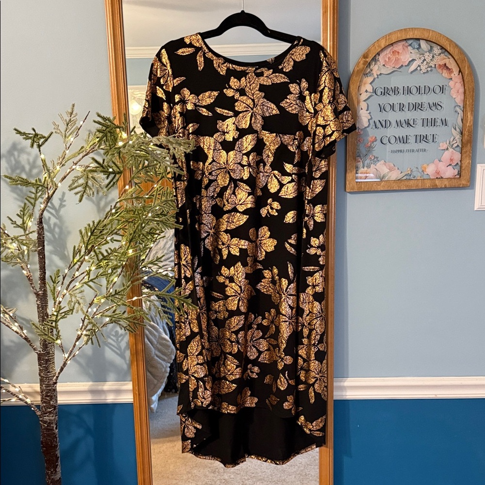 Elegant Black Dress with Gold Floral Print